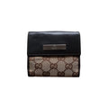 gucci GG canvas metal bar wallet